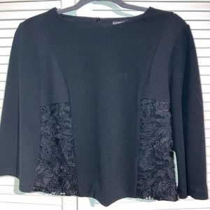 Black express top with lace detail.